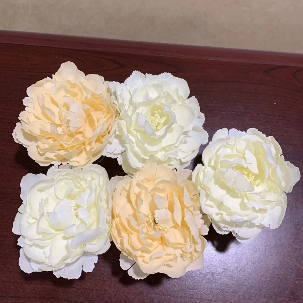 Set of five floral votive table decorations with lights